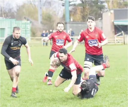  ?? ?? Falling just short
Jack Frame tries to break a tackle in Linlithgow’s narrow National Shield loss (Pic: Graham Black)
