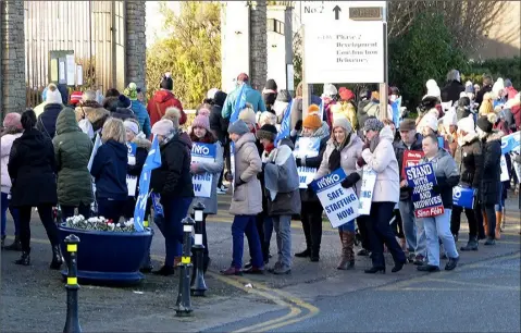  ??  ?? Nurses on industrial action outside Our Lady of Lourdes Hospital.