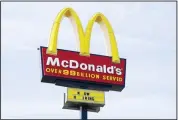  ??  ?? A sign is displayed outside a McDonald’s restaurant in Des Moines, Iowa. (AP)