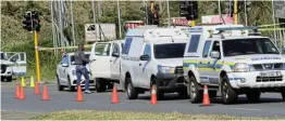  ?? Pictures: MICHAEL PINYANA ?? SHOOTOUT: A local businessma­n, top centre, was attacked by armed robbers at the Sasol service station, off the N6 in Abbotsford, East London, on Monday. Gunfire was exchanged between the two parties before the robbers took off with an unknown amount of cash.