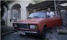  ??  ?? Havana resident Leandro Cueto poses for a portrait with his prized 1986 model, which he has owned since new. Photograph: Ismael Francisco/AP