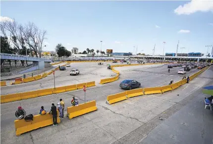  ?? ALEJANDRO TAMAYO U-T FILE ?? Minimal traffic is seen at the U.S.-Mexico border at San Ysidro in March 2020. The land border is still closed to nonessenti­al travel.