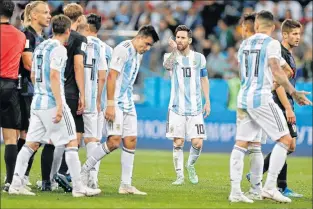  ?? AP PHOTO ?? Argentina’s Lionel Messi, centre, walks off the pitch following Thursday’s group D match against Croatia at the 2018 soccer World Cup in Nizhny Novgorod, Russia. Croatia defeated Argentina 3-0.