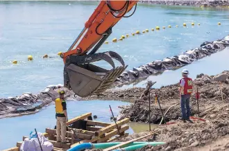  ??  ?? Alberta Environmen­t and Parks and the City of Calgary are working together using bioenginee­ring to rehabilita­te a section of river bank along the Bow River to provide a better habitat for fish.