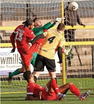  ?? Karl Dunkerley ?? Southport goalkeeper Tony McMillan clears his line