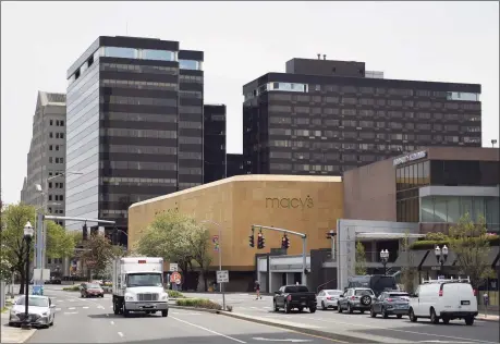  ?? Tyler Sizemore / Hearst Connecticu­t Media ?? The office building, at left, at 177 Broad St. in downtown Stamford is home to Indeed. The coronaviru­s outbreak more than a year ago forced companies to vacate their offices and brought the commercial real estate market to a near halt. While some companies are signing new deals now, leasing activity still significan­tly trails previous years’ levels.