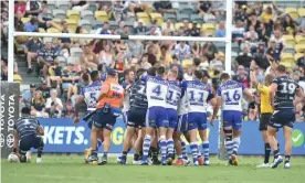  ?? Photograph: Scott Radford-Chisholm/AAP ?? A scuffle breaks out after the Cowboys’ Valentine Holmes was hit high by the Bulldogs’ Jack Hetheringt­on in Townsville.