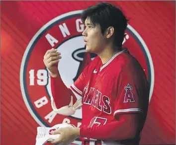  ?? Allen J. Schaben Los Angeles Times ?? SHOHEI OHTANI tore a ligament in his elbow while pitching on Aug. 23. He remained the Angels’ designated hitter until Sept. 3, when he hurt his oblique, before deciding to shut down his season last weekend.