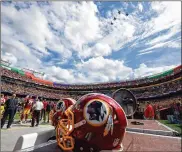  ?? NICK WASS / AP ?? The team formerly known as the Redskins will go by Washington Football Team this season until a new name is chosen. Washington replace the Indian head logo on its helmets with a player’s jersey number.