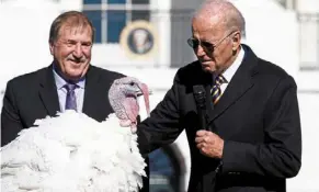  ?? ?? Free bird: biden speaking as he pardons the national Thanksgivi­ng Turkey in the annual ceremony on the south Lawn of the White House in Washington. — reuters