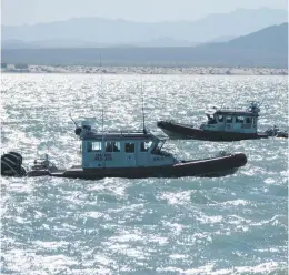  ?? ?? Mexican Navy rescue vessels navigate near the Seahorse, the new Sea Shepherd vessel deployed to help on the efforts to save the endangered vaquita porpoise, near San Felipe, in the Gulf of California, Baja California state, northweste­rn, Mexico.