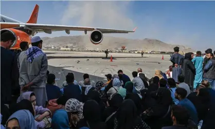  ?? Photograph: AFP/Getty Images ?? Thousands of Afghans mobbed Kabul’s airport trying to flee the Taliban.