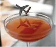  ??  ?? A jet is featured on a drink at the Polaris lounge at IAH.