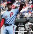  ?? DERIK HAMILTON — THE ASSOCIATED PRESS ?? Phillies starting pitcher Ben Lively receives a new ball after giving up a three-run home run to Arizona’s Nick Ahmed (13) during the third inning on Thursday.