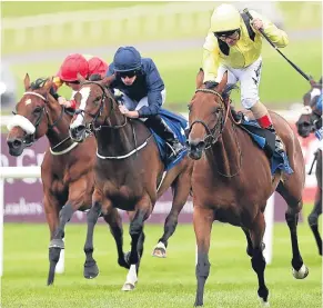  ?? PA. ?? Roger Varian’s Nezwaah, in the hands of Andrea Atzeni, claims Group One glory in the Pretty Polly Stakes at the Curragh yesterday.