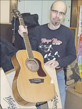  ?? JOnaThan Riley/ TC Media ?? Dave Mingo is getting ready to host the 18th annual Mingo’s Guitar Show and Sale at the Marigold Cultural Centre on April 22.