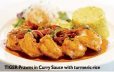  ??  ?? TIGER Prawns in Curry Sauce with turmeric rice