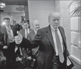  ?? AP/J. SCOTT APPLEWHITE ?? President Donald Trump, with Health and Human Services Secretary Tom Price, arrives Tuesday at the Capitol in Washington to rally support among GOP lawmakers for the Republican health care overhaul.