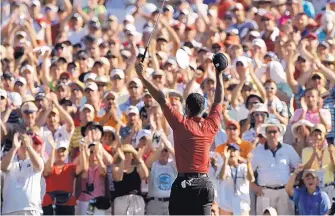  ?? CHARLIE RIEDEL/ASSOCIATED PRESS FILE ?? Tiger Woods celebrates after winning the 2007 PGA Golf Championsh­ip in Tulsa, Okla. Up next weekend: his virus relief fundraiser with Phil Mickelson, Peyton Manning and Tom Brady.