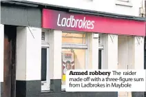  ??  ?? Armed robbery The raider made off with a three- figure sum from Ladbrokes in Maybole