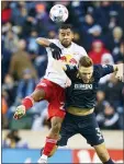  ?? CHRIS SZAGOLA — ASSOCIATED PRESS ?? The Red Bulls’ Cristian Casseres Jr, left, heads a ball over the Union’s Jack Elliott during the second half Sunday.