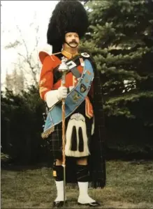  ?? COURTESY THE BEAN FAMILY ?? John Bean was drum major for the Commission­er’s Own Pipes and Drums of the OPP.