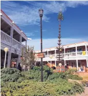  ?? COURTESY THE CITY OF ALBUQUERQU­E ?? The 7,000-pound metal tree stand holds about 150 trees to make up the over twostory-high Christmas tree in Plaza Don Luis.