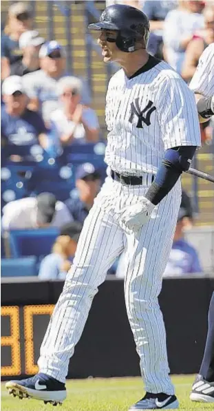  ?? AP ?? Troy Tulowitzki gets fired up after hitting solo home run against Jays.