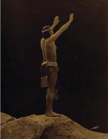  ??  ?? Edward S. Curtis (1868-1952), Prayer to the Stars, orotone in original batwing frame, 13½ x 10½”