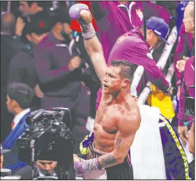  ?? Madeline Carter Las Vegas Review-journal ?? Canelo Alvarez is pumped up after beating Jermell Charlo in an undisputed world super middleweig­ht title bout at T-mobile Arena.