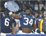  ?? RON JENKINS — THE ASSOCIATED PRESS ?? Penn State defensive end Shane Simmons celebrates after his team beat Memphis in the Cotton Bowl last year. The once highly prized recruit is hoping to assemble a strong senior season in State College.