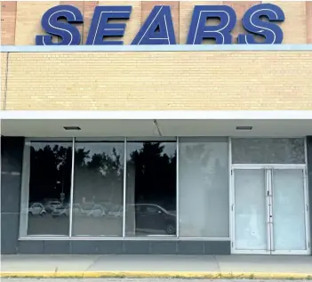  ?? LEAH HENNEL/POSTMEDIA ?? The Sears store is seen at North Hill Mall in Calgary, Alta., on Tuesday. The company gave a dire warning about its survival, saying it will only keep operating if it finds a new source of financing.