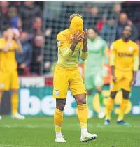  ??  ?? GETTING SHIRTY Callum Robinson shows his despair