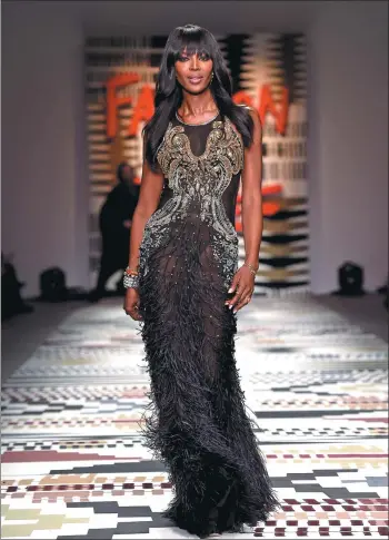  ?? TIMMS / PHOTOS.COM ?? Naomi Campbell opens up about her relationsh­ip with Tunisian designer Azzedine Alaia, whom she has called “Papa” since the age of 16.