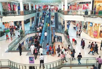  ?? Virendra Saklani/Gulf News Archive ?? Shoppers at Deira City Centre in Dubai. The World Bank has made a special mention of the UAE’s progress in introducin­g new reforms and entry into the top 20 in the global ranking.