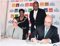  ??  ?? Minister of Foreign Affairs and Foreign Trade Senator Kamina Johnson Smith (left) and United Nations Resident Coordinato­r Bruno Pouez sign an agreement for the UN Multi-Country Sustainabl­e Developmen­t Framework (UNMSDF) in Jamaica at the Spanish Court...