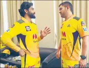  ??  ?? Ravindra Jadeja (L) with MS Dhoni.