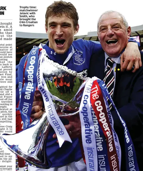  ??  ?? Sportsmail.
Trophy time: matchwinne­r Jelavic with Smith, who brought the £4m Croatian to Rangers