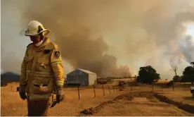  ??  ?? Have we seen individual­ism peak? … a firefighte­r working in the disaster area near Tumburumba, Australia, on 11 January. Photograph: Sam Mooy/Getty Images