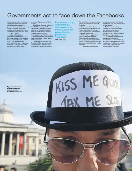  ?? Picture / AP ?? A protestor dressed as a ‘ tax dodger' at a demonstrat­ion in London. The proposal: Why? Whynot? Likely impact: Where it’s at: