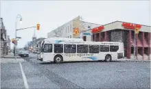  ?? JULIE JOCSAK TORSTAR FILE PHOTO ?? A Niagara Region Transit bus makes its way down Carlisle Street in downtown St. Catharines.