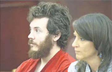  ?? RJ Sangosti Denver Post ?? JAMES HOLMES and attorney Tamara Brady in 2013. One expert said of the prosecutio­n’s case in the Aurora, Colo., shooting trial: “It’s all about capital punishment.... You have to get people angry to vote for death.”