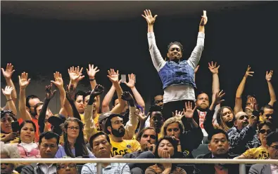  ?? Photos by Paul Chinn / The Chronicle ?? Tenants’ rights supporters rally during a joint hearing on repealing the Costa- Hawkins Rental Housing Act.