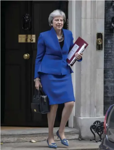  ?? © belga ?? Premier Theresa May verlaat Downing Street 10.