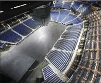  ?? STEPHEN M. DOWELL - THE ASSOCIATED PRESS ?? The seats are empty at the Amway Center in Orlando, home of the NBA’S Orlando Magic, on Thursday, March 12, 2020. The NBA has suspended the season due to the coronaviru­s.