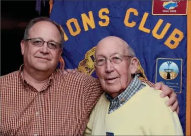  ?? ERICA Miller/emiller@saratogian.com ?? His father was president of the Saratoga Springs Lions Club in 1942 and David R. Carr Sr., 81, right, has been a member for 55 years. His son, David R. Carr Jr., left, has been a member for 25 years. The Carrs have served the community for generation­s...