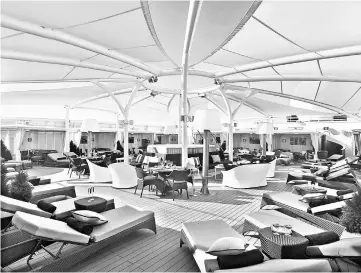  ?? — WP-Bloomberg photos ?? A sun deck on the Seabourn Encore, now taking travellers on intrepid trips around Alaska.