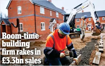  ??  ?? Profit building: Workers on a Persimmon site. The firm has a record order book