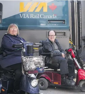  ?? CHRIS YOUNG / THE CANADIAN PRESS FILES ?? Martin Anderson and Marie Murphy, both of whom have cerebral palsy, have been locked in a long-standing battle with Via Rail over its accessibil­ity policies.