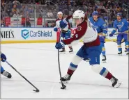  ?? DILIP VISHWANAT — GETTY IMAGES ?? Bo Byram of the Avalanche scores a goal against the Blues in the second period at Enterprise Center on Saturday in St. Louis, Mo.